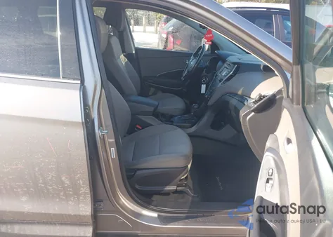 2014 Hyundai Santa Fe Sport 2.4L z USA, uszkodzony, nr VIN 5XYZUDLB7EG210449